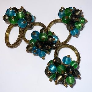 Pier 1 imports peacock 🦚 color napkin rings. Set of 4
